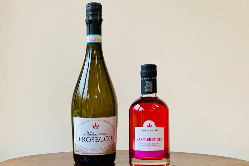 Escapism Cocktail Bundle, a bottle of prosecco and half bottle of Raspberry Gin Liqueur
